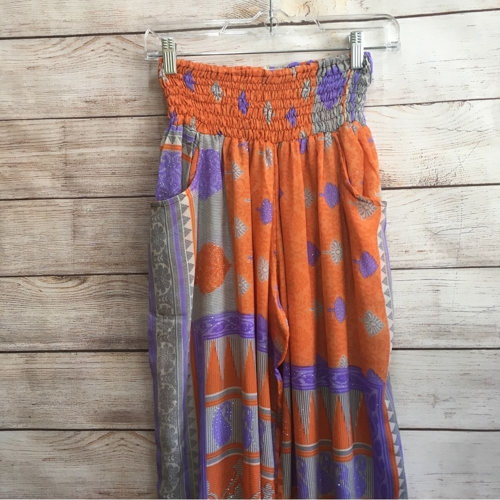 EARTHBOUND TRADING HAREM PANTS IN ORANGE AND PURPLE - Picture 2 of 9